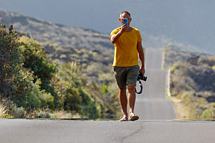 Man walking on road - El Hierro