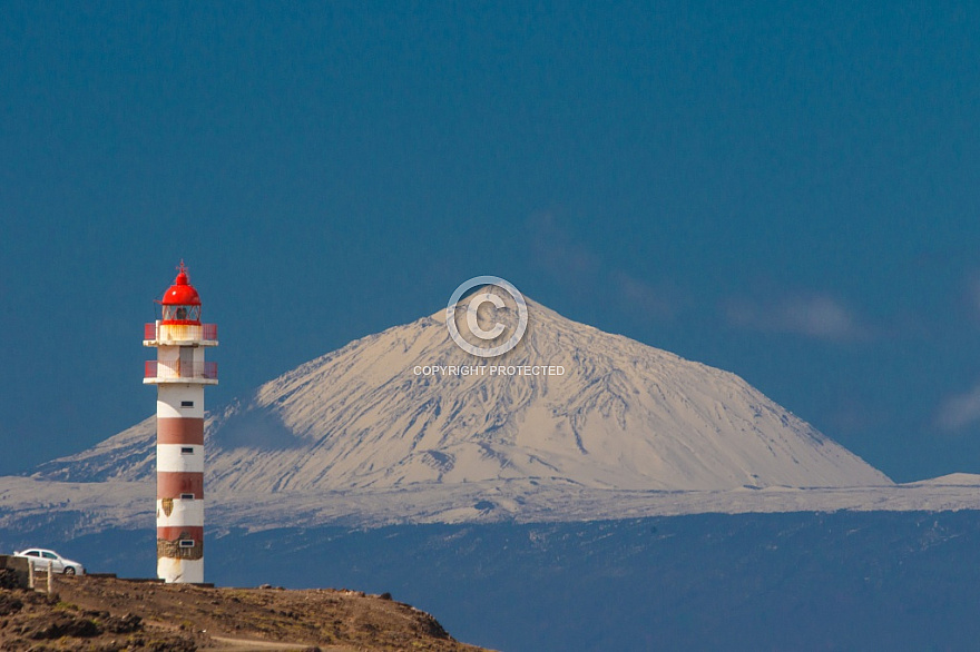 Snowcapped Teide and the lighthouse of Sardina de Gáldar